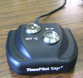 TimePilot Tap+, used on a desk.